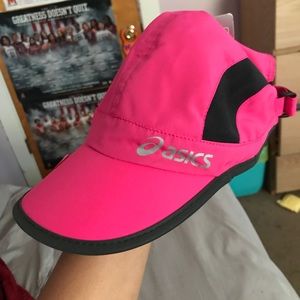 Pink and black ASICS hat